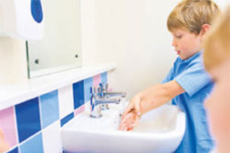 Children Washing Hands At School